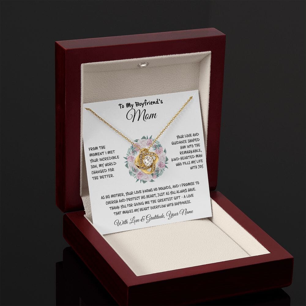 Love Knot Necklace in yellow gold with To My Boyfriend's Mom card in an LED gift box shown in low light