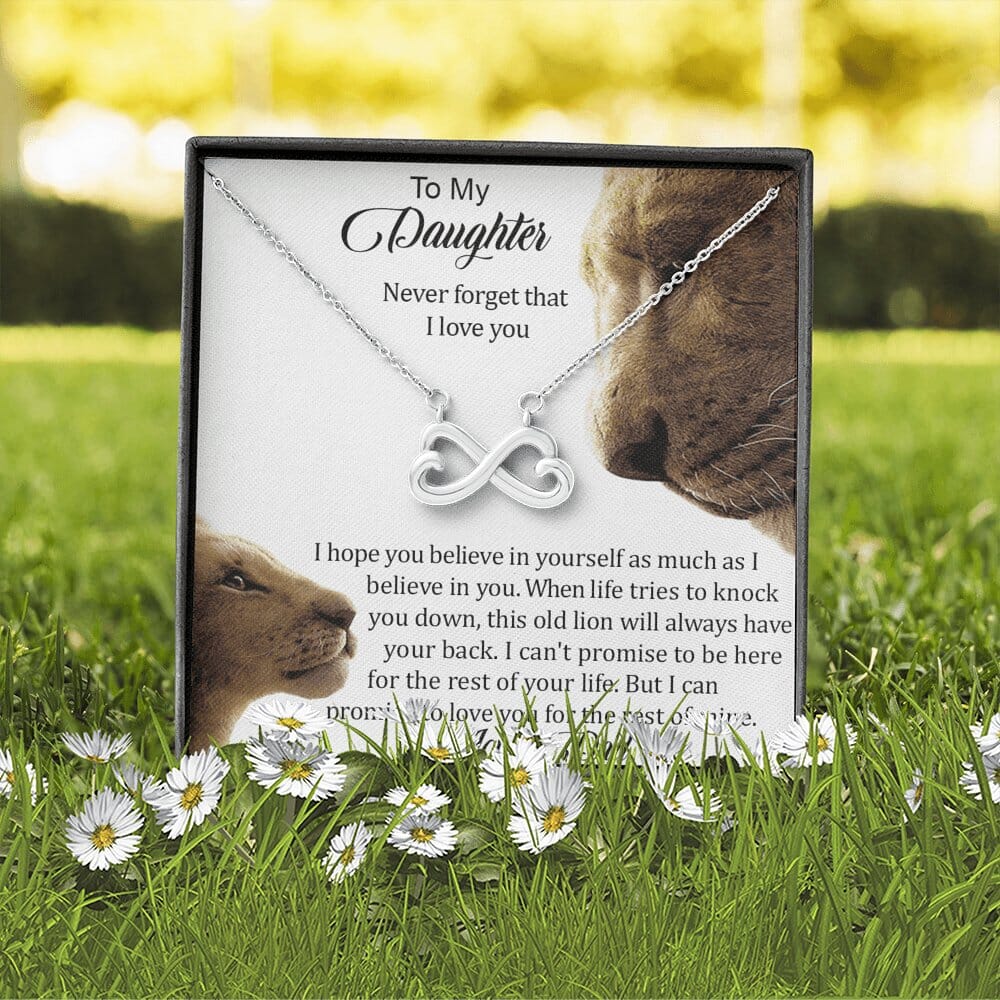 Infinity Necklace with To My Daughter message card displayed on grass with daisies