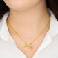 Model wearing the Infinity Necklace, yellow gold finish