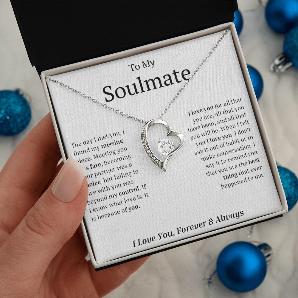 Hand holding the To My Soulmate message card with Eternal Love Necklace