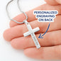 Close up of the Personalized Cross Necklace pendant showing custom engraving
